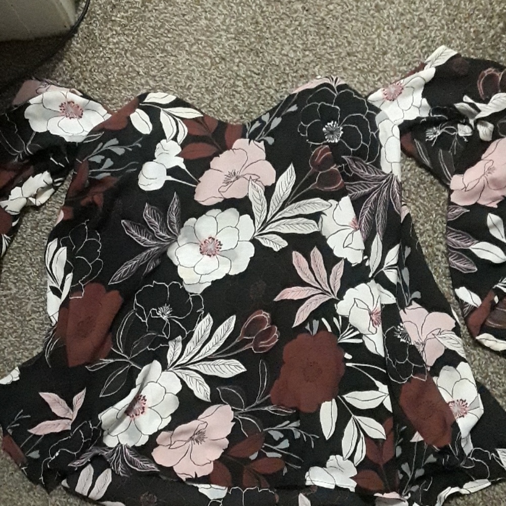 Flowery blouse.